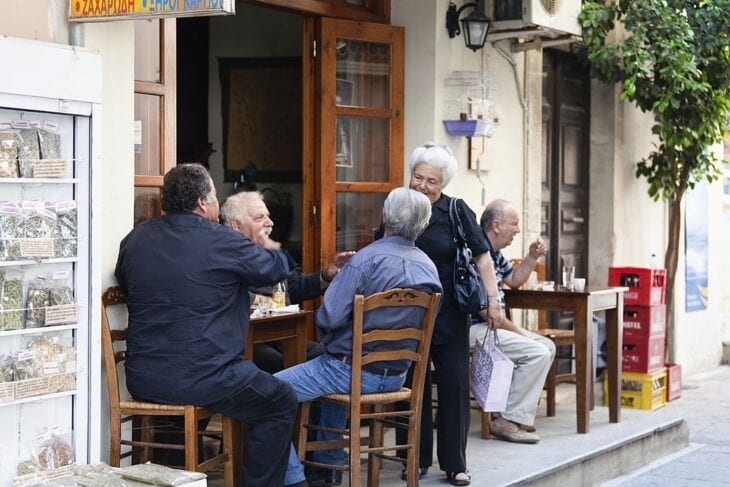 Local Seniors in cafe in Crete